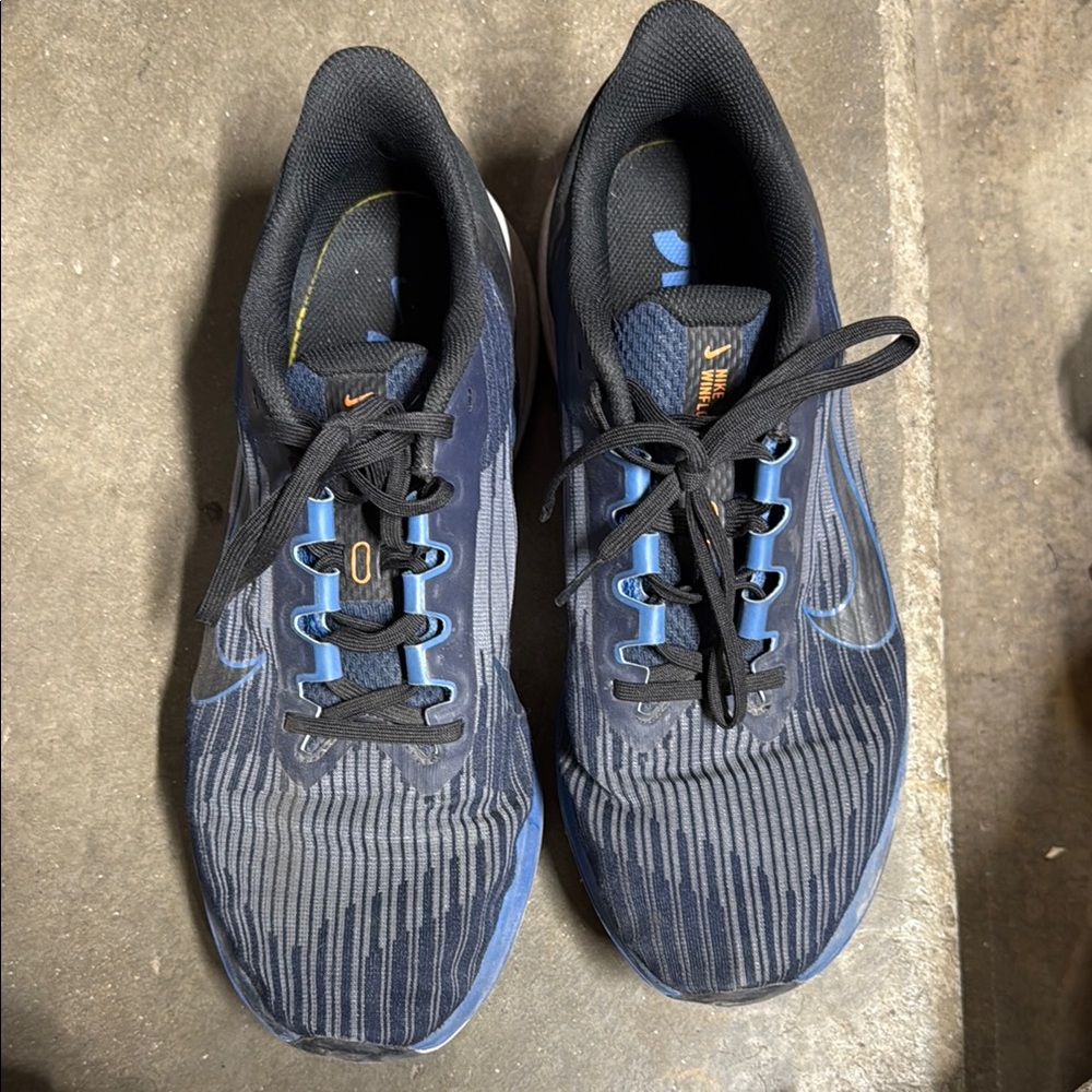 Nike Black and Blue Athletic Shoes with Ribbed Texture